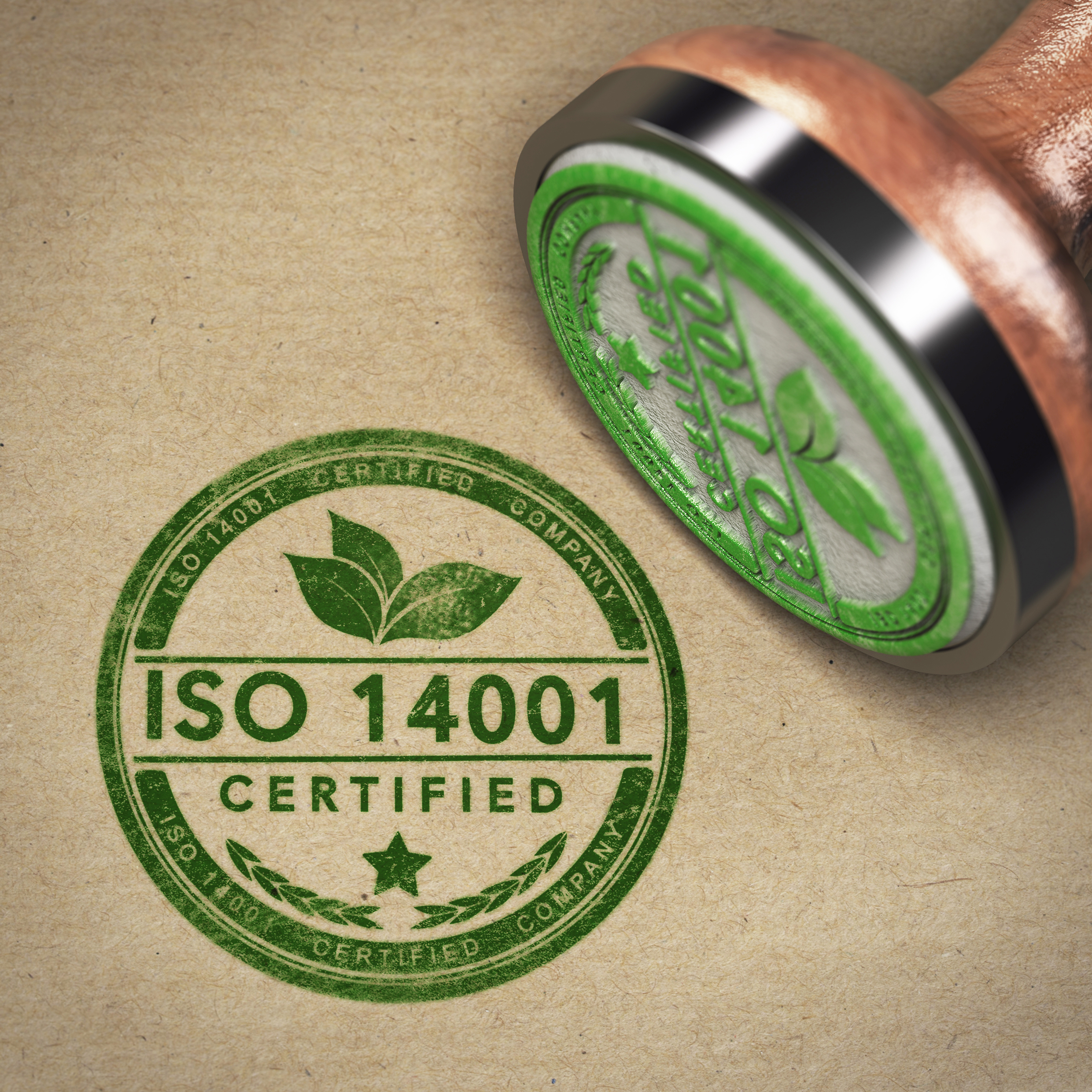 3D illustration of a rubber stamp with the text ISO 14001 over brown cardboard background